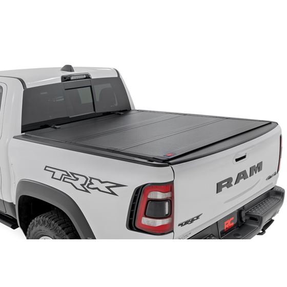 Hard Tri-Fold Flip Up Bed Cover - 5'7" - Toyota Tundra (22-23) (49514551) 1